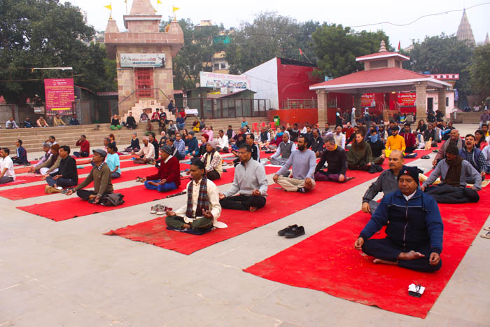 things to do in Varanasi yoga at assi ghat